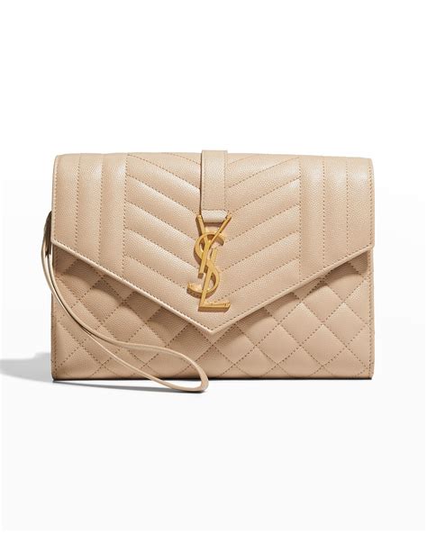 ysl monogram quilted clutch.